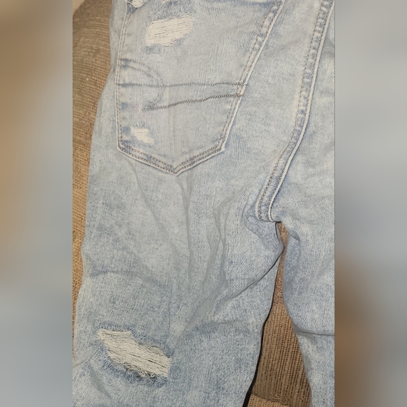 American Eagle Outfitters Destroyed Light Acid Wash Super Stretchy Jeans - Picture 11 of 15
